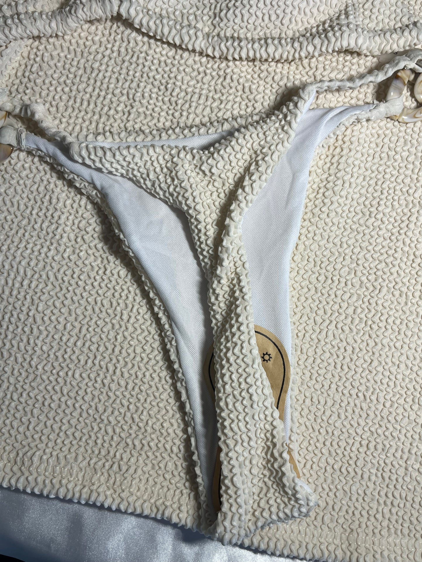 White and gold swimsuit